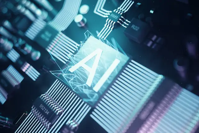 Chip de circuito impreso con las letras AI iluminadas en el centro y pistas luminosas en tonos celestes