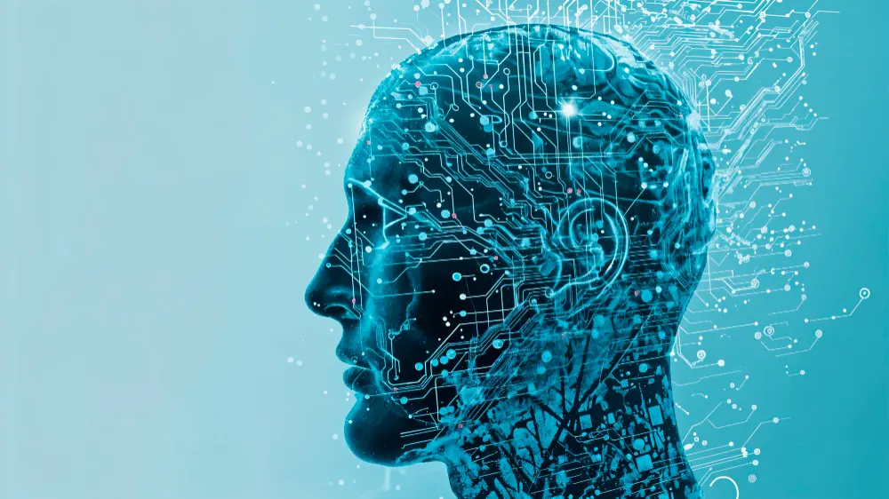 Perfil de una cabeza humana en tonos celestes con circuitos y puntos de luz que se extienden sobre el cerebro.