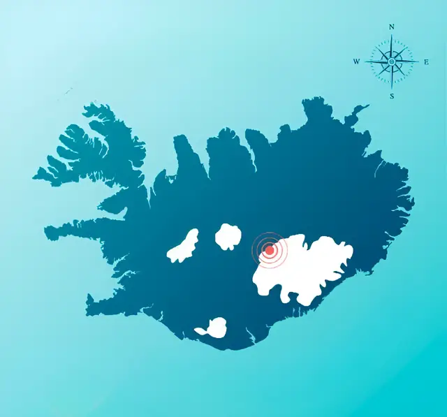 Mapa estilizado de una isla en azul oscuro sobre fondo celeste, con una brújula y un punto rojo sobre una zona blanca